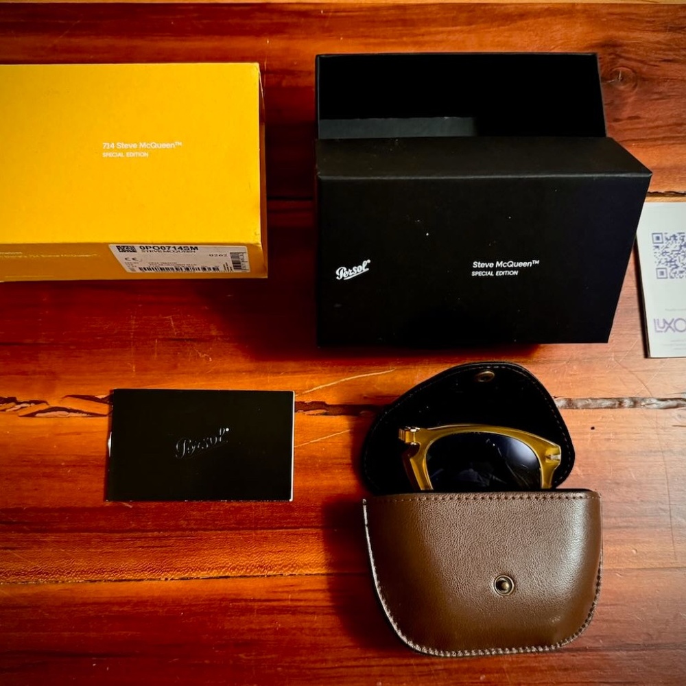 Persol Steve McQueen folding sunglasses. Yellow frames, blue lenses.